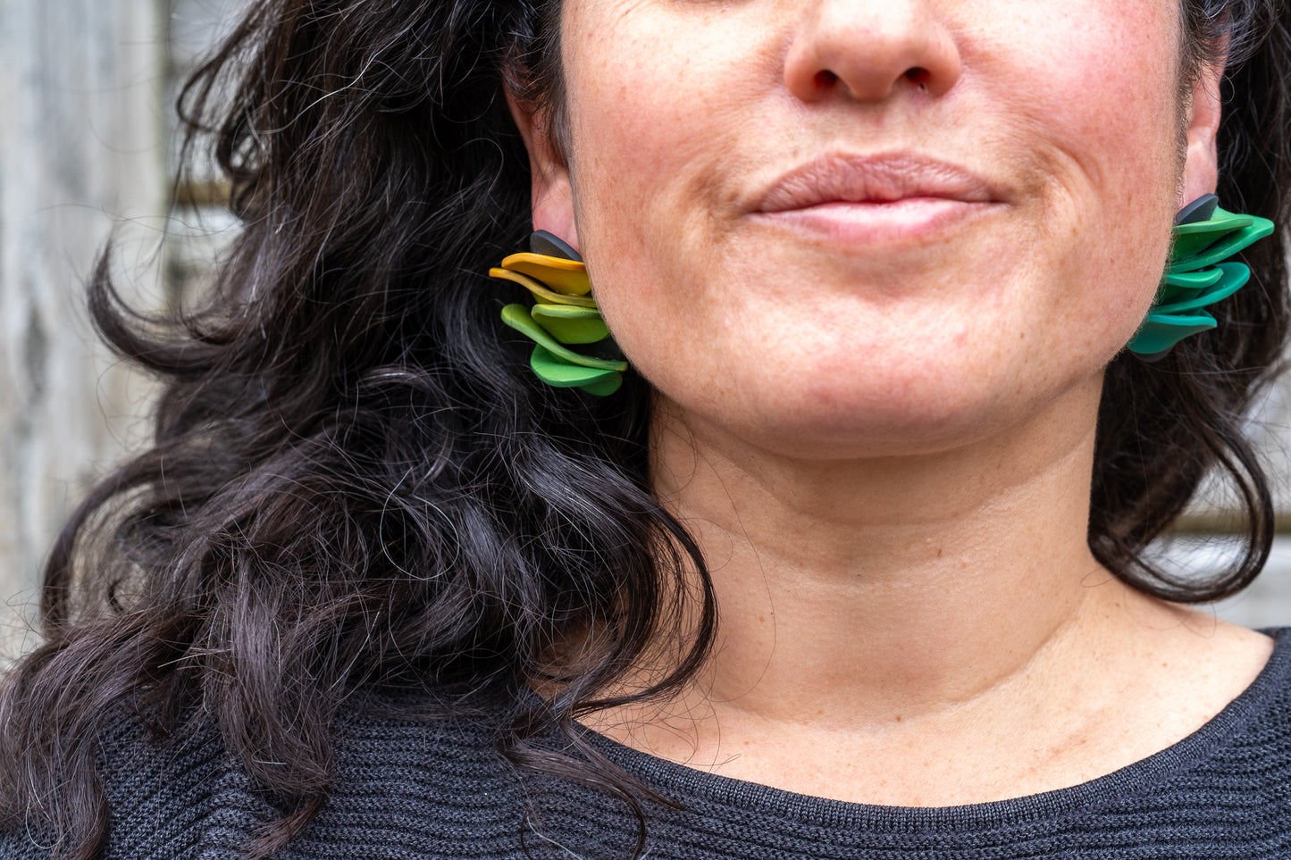 Asymmetrical green petals studs