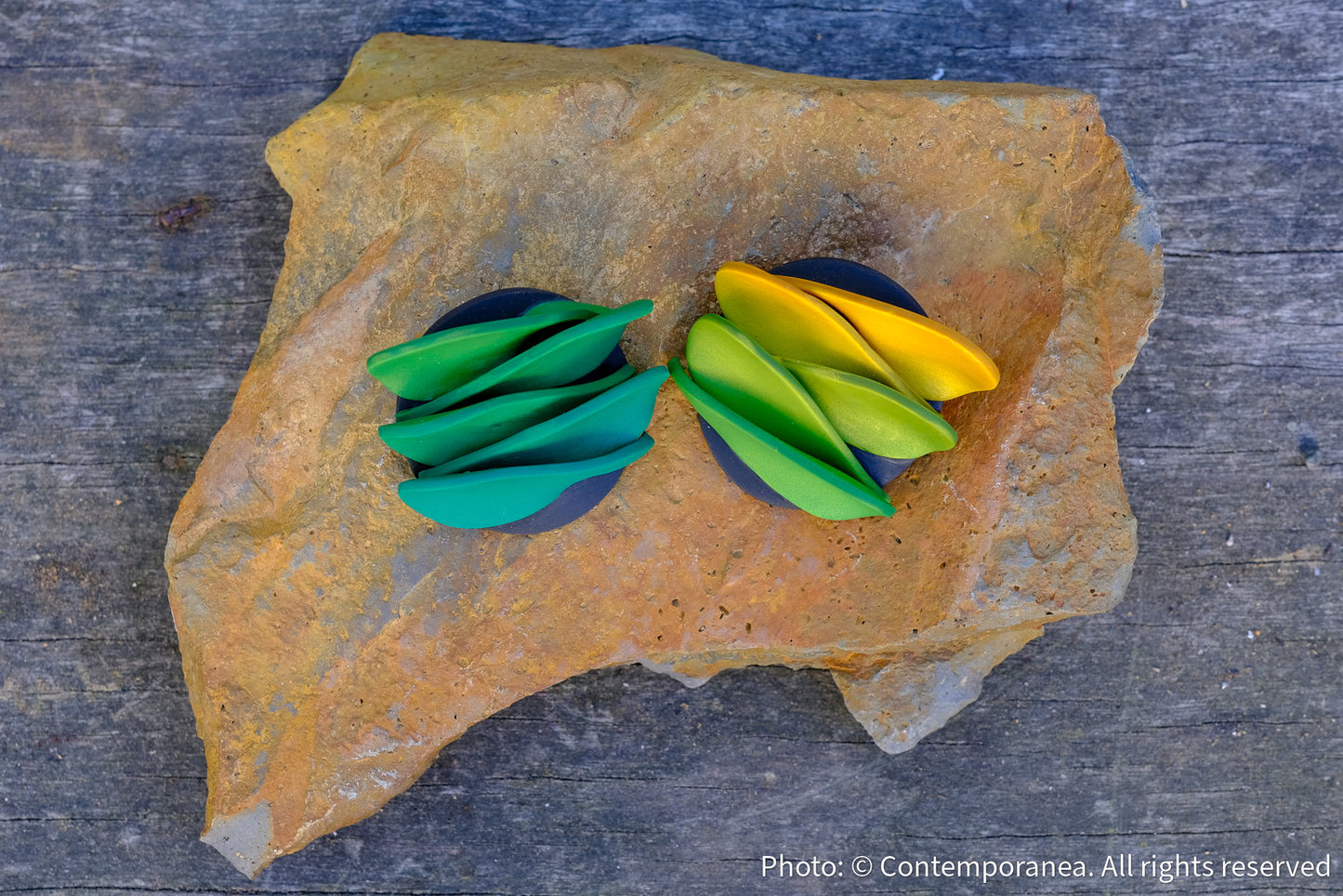 Asymmetrical green petals studs