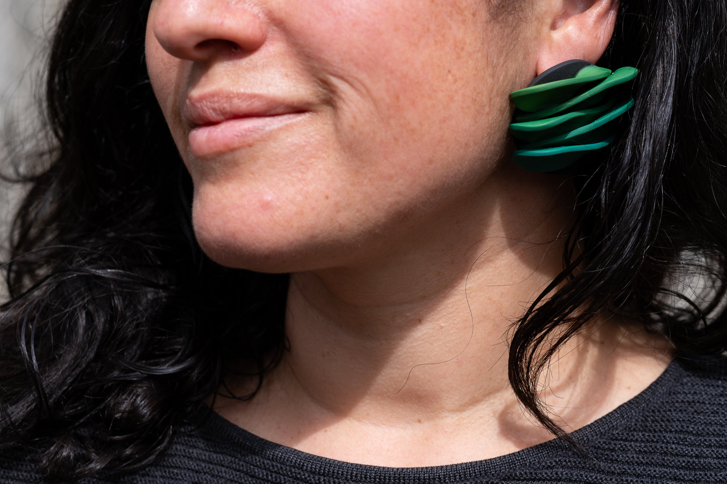 Asymmetrical green petals studs