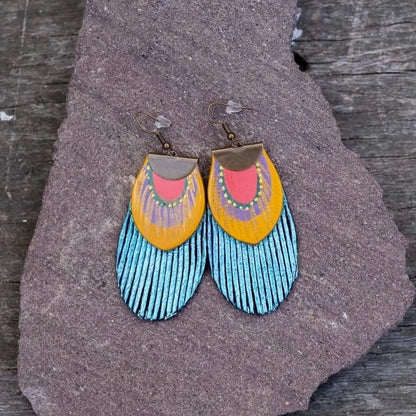 Feather - metallic blue earrings