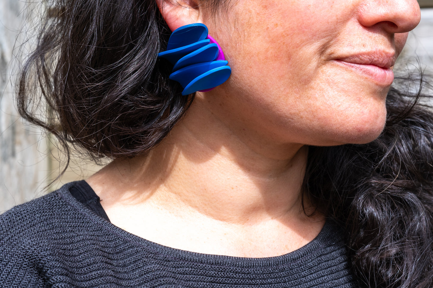 Asymmetrical blue petals studs