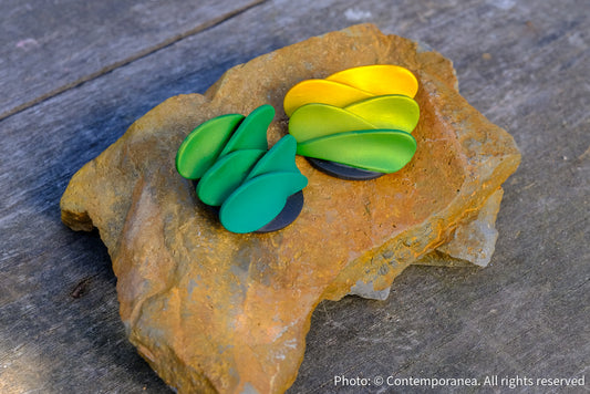 Asymmetrical green petals studs