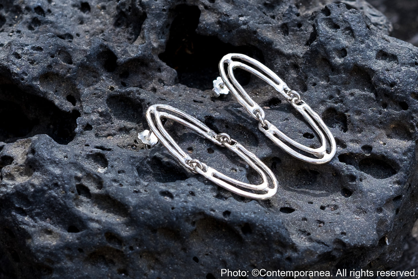 Reflejo earrings in Silver