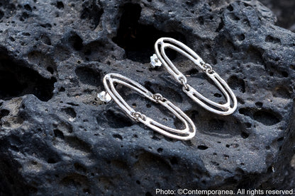 Reflejo earrings in Silver